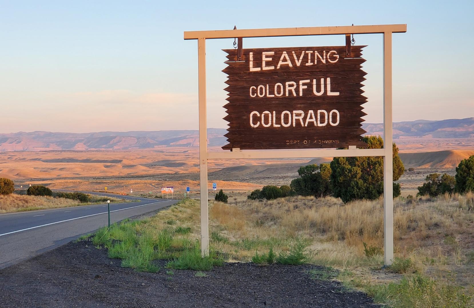 Leaving Colorful Colorado Board Near a Road